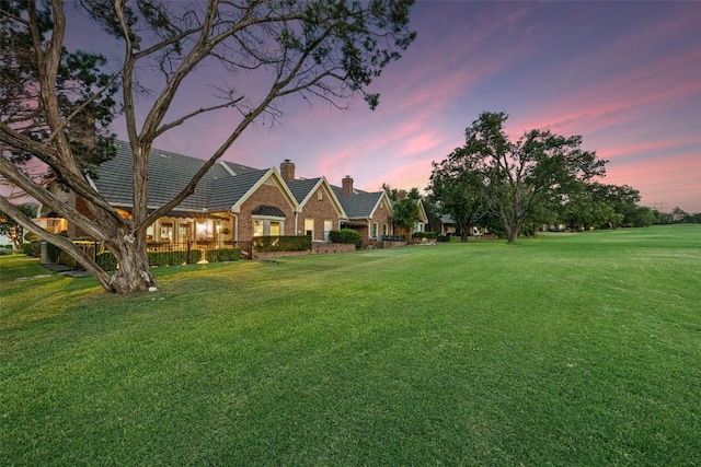 40 Tournament Way Unit G-32, The Hills, TX 78738 - yard at dusk featuring a lawn