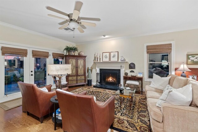 40 Tournament Way Unit G-32, The Hills, TX 78738 - living area with light wood-style floors, crown molding, a brick fireplace, french doors, and ceiling fan