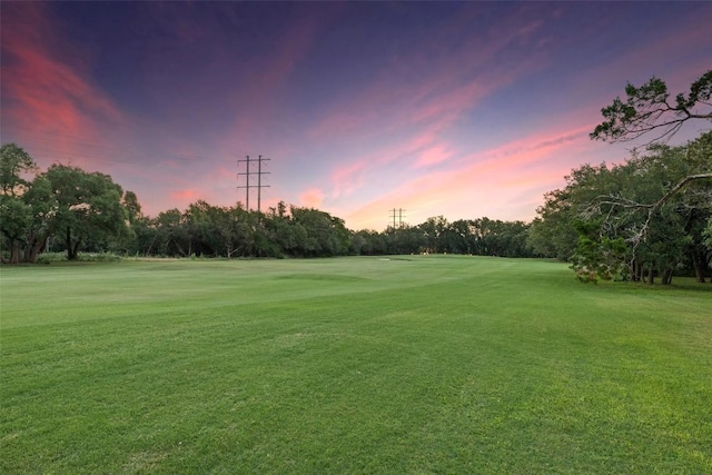 40 Tournament Way Unit G-32, The Hills, TX 78738 - view of property's community featuring a yard, view of wooded area, and golf course view