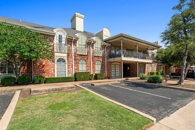7920 Rockwood Ln Unit 232, Austin, TX 78757 - view of property featuring uncovered parking