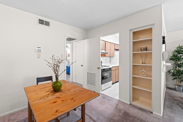 7920 Rockwood Ln Unit 232, Austin, TX 78757 - dining area with light colored carpet and baseboards