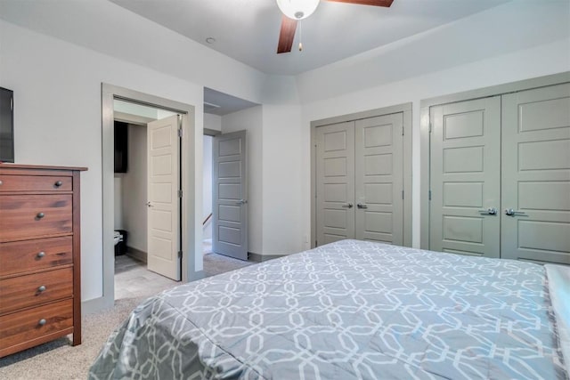 12160 Abbey Glen Ln, Austin, TX 78753 - carpeted bedroom with two closets and ceiling fan