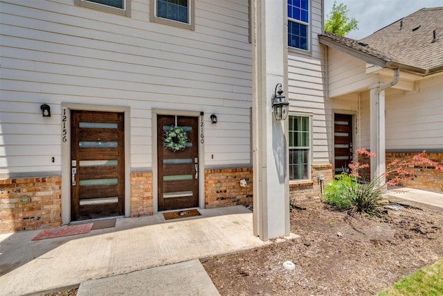 12160 Abbey Glen Ln, Austin, TX 78753 - property entrance featuring brick siding