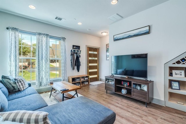 12160 Abbey Glen Ln, Austin, TX 78753 - living area with wood finished floors and recessed lighting