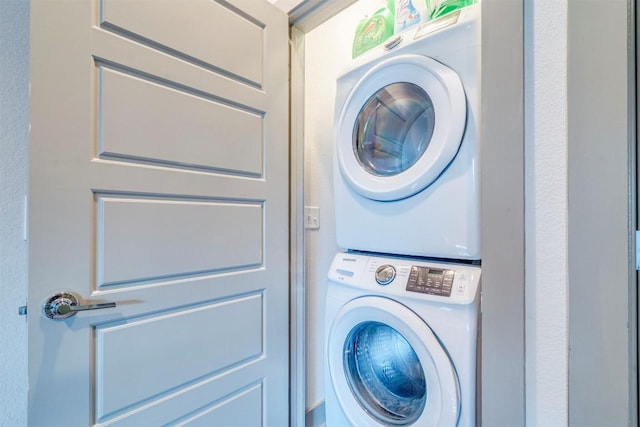 12160 Abbey Glen Ln, Austin, TX 78753 - washroom featuring estacked washer and dryer