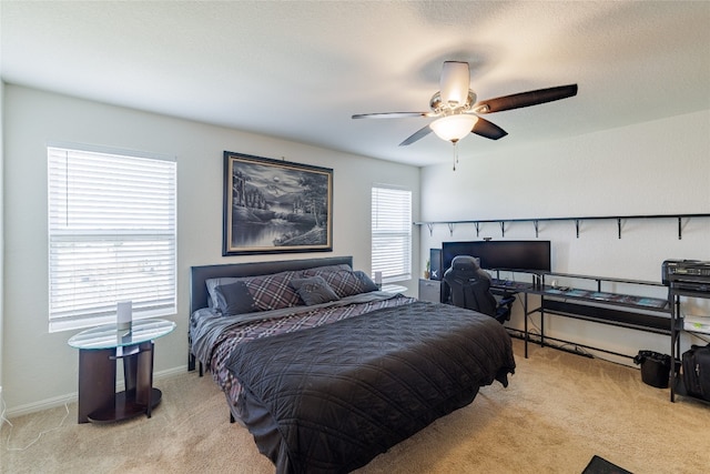 301 Wonderful Life Way, Jarrell, TX 76537 - bedroom featuring carpet, baseboards, and ceiling fan