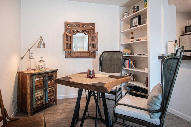 4306 Ave A Unit 105, Austin, TX 78751 - home office with baseboards and wood finished floors