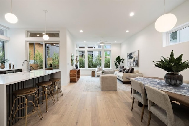 900 S 2nd St Unit 20, Austin, TX 78704 - dining room featuring light wood-style flooring, a ceiling fan, and recessed lighting