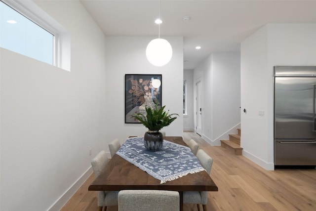 900 S 2nd St Unit 20, Austin, TX 78704 - dining space featuring baseboards, light wood-type flooring, recessed lighting, and stairway
