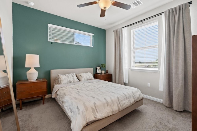 8012 Mandela Bnd, Austin, TX 78744 - bedroom featuring light carpet, baseboards, and ceiling fan