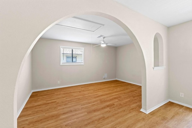 3103 Steck Ave, Austin, TX 78757 - unfurnished room featuring light wood-style flooring, a ceiling fan, baseboards, and attic access