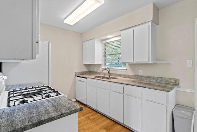 3103 Steck Ave, Austin, TX 78757 - kitchen featuring a sink, white appliances, and white cabinetry