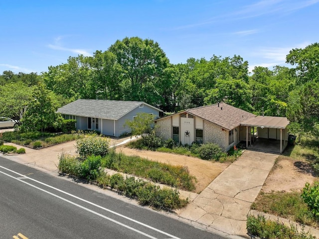 3103 Steck Ave, Austin, TX 78757 - view of front of home featuring driveway and roof with shingles