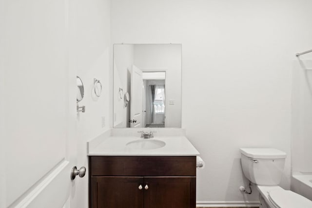 504 Blanco Vis, Georgetown, TX 78626 - bathroom with vanity, toilet, and baseboards