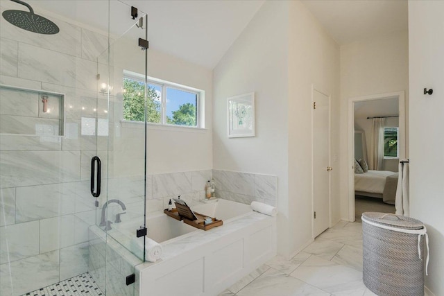 10807 Pinkney Ln, Austin, TX 78739 - ensuite bathroom featuring a garden tub, a stall shower, marble finish floors, and lofted ceiling