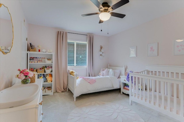 10807 Pinkney Ln, Austin, TX 78739 - bedroom with carpet flooring, a ceiling fan, and a sink