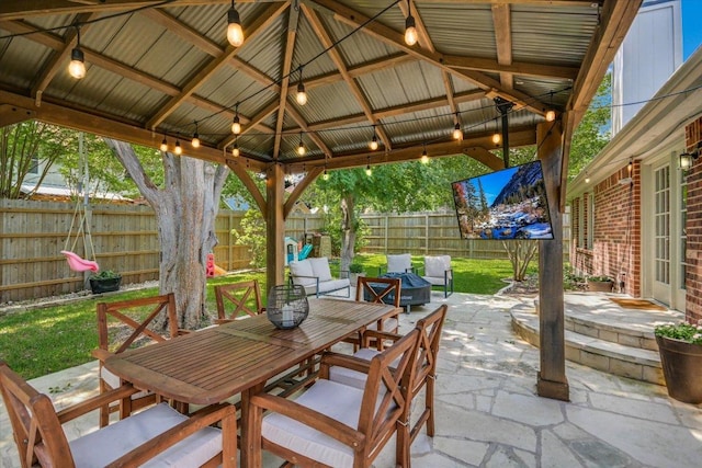 10807 Pinkney Ln, Austin, TX 78739 - fenced backyard featuring a patio, a gazebo, and outdoor dining area