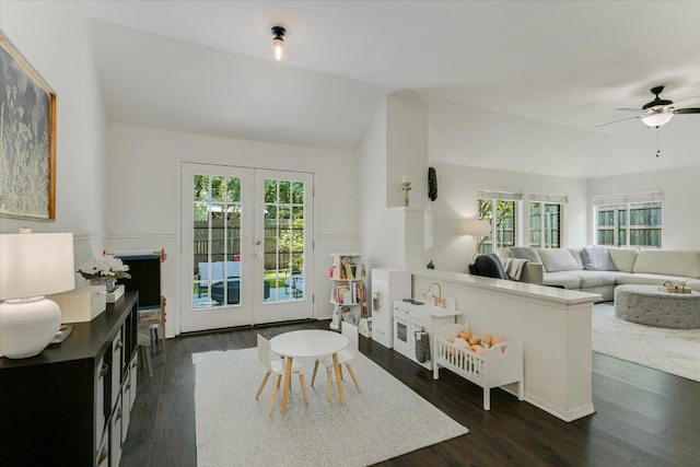 10807 Pinkney Ln, Austin, TX 78739 - living room with french doors, ceiling fan, dark wood finished floors, and lofted ceiling