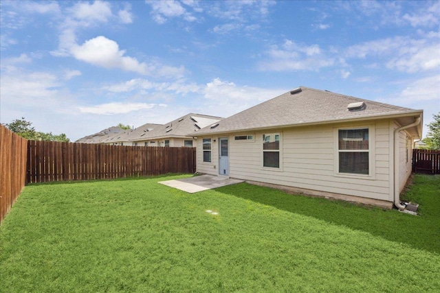 3620 Breckenridge Dr, Austin, TX 78744 - rear view of property featuring roof with shingles and a patio