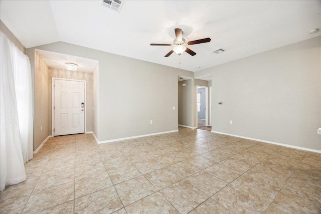 3620 Breckenridge Dr, Austin, TX 78744 - spare room featuring a ceiling fan, light tile patterned floors, baseboards, and lofted ceiling