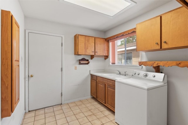 356 Cedar Ln, Cedar Creek, TX 78612 - laundry area with washer / clothes dryer, cabinet space, and light tile patterned flooring