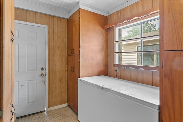 356 Cedar Ln, Cedar Creek, TX 78612 - laundry area featuring ornamental molding and wood walls