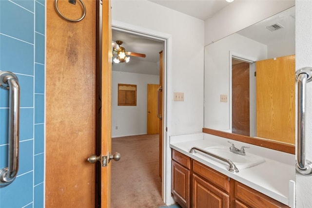 356 Cedar Ln, Cedar Creek, TX 78612 - bathroom featuring vanity and ceiling fan