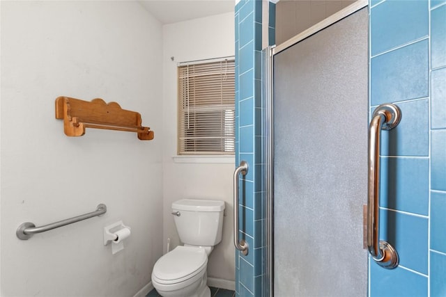 356 Cedar Ln, Cedar Creek, TX 78612 - bathroom featuring a shower stall and toilet