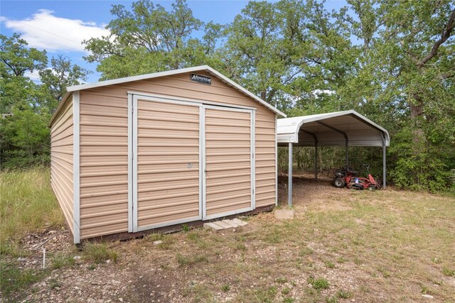 356 Cedar Ln, Cedar Creek, TX 78612 - view of shed with a carport