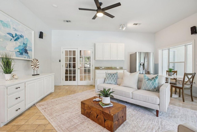 2302 Bahama Rd, Austin, TX 78733 - living area with ceiling fan and french doors