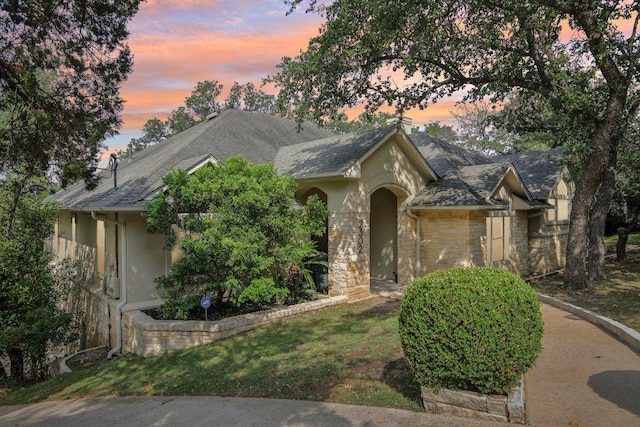2302 Bahama Rd, Austin, TX 78733 - view of front of property with stucco siding and stone siding