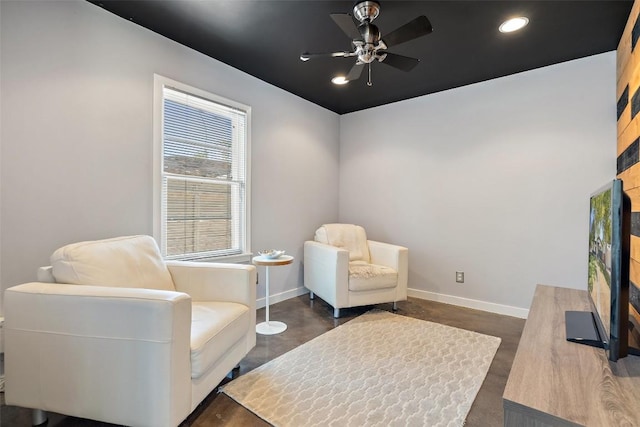 7517 Saint Louis St, Austin, TX 78757 - living area with baseboards, recessed lighting, ceiling fan, and concrete flooring