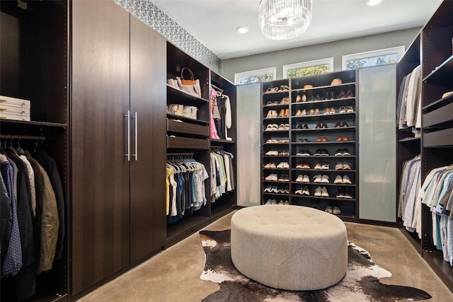 7517 Saint Louis St, Austin, TX 78757 - walk in closet featuring a chandelier