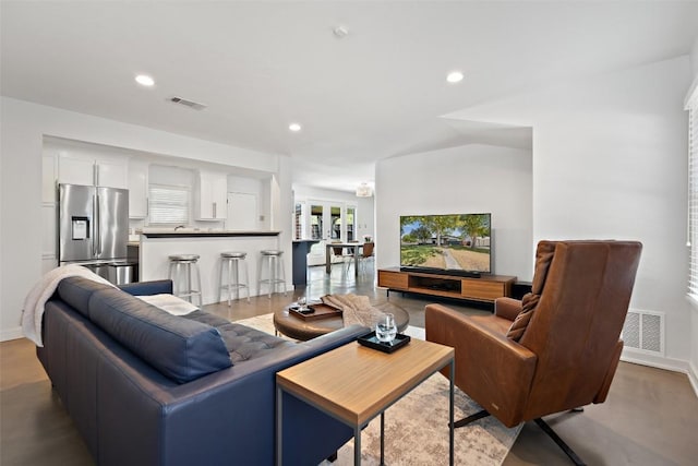 7517 Saint Louis St, Austin, TX 78757 - living room featuring baseboards and recessed lighting