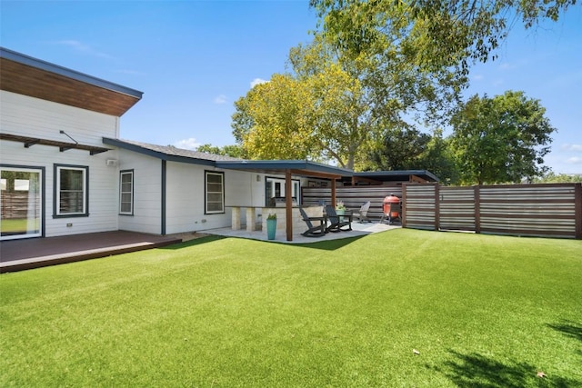 7517 Saint Louis St, Austin, TX 78757 - view of yard featuring a patio area and a deck