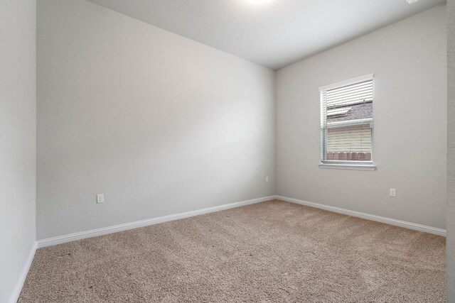 9904 Comely Bnd, Manor, TX 78653 - carpeted empty room featuring baseboards