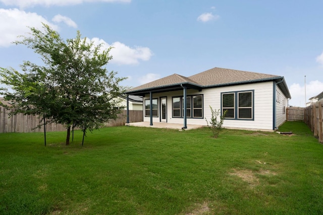 9904 Comely Bnd, Manor, TX 78653 - rear view of property featuring a patio and a fenced backyard