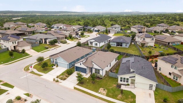 9904 Comely Bnd, Manor, TX 78653 - aerial perspective of suburban area with a forest