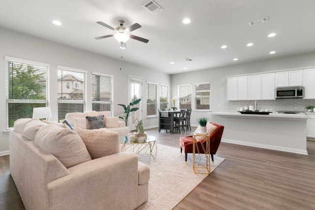 9904 Comely Bnd, Manor, TX 78653 - living room with recessed lighting, light wood-type flooring, and ceiling fan