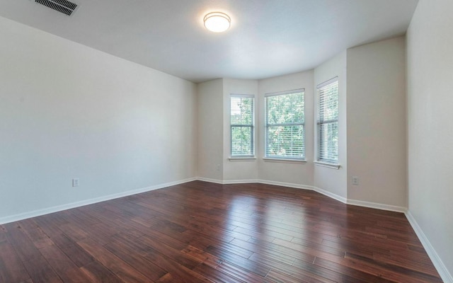 480 Middle Crk, Buda, TX 78610 - empty room with dark wood-type flooring and baseboards
