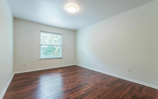 480 Middle Crk, Buda, TX 78610 - unfurnished room with dark wood-style floors and baseboards