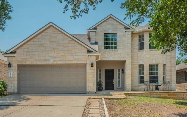 480 Middle Crk, Buda, TX 78610 - french country style house with stone siding, driveway, and a garage