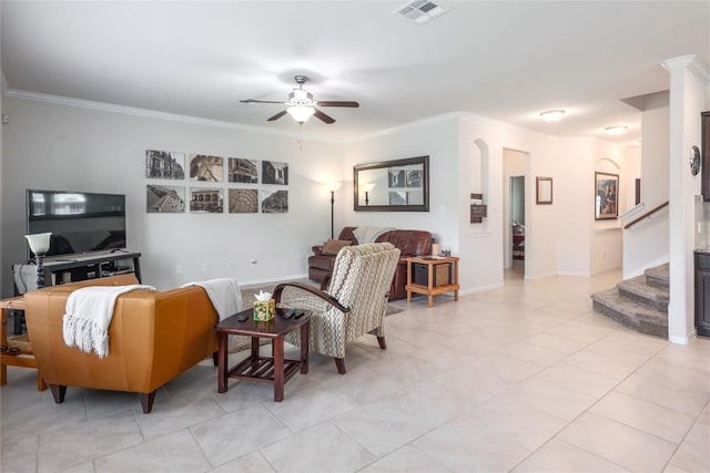 1317 Gaviota Ln, Leander, TX 78641 - living room with a ceiling fan, ornamental molding, stairs, and light tile patterned flooring
