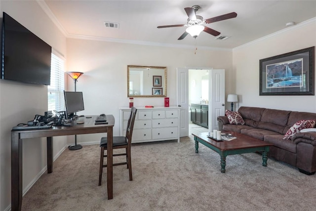 1317 Gaviota Ln, Leander, TX 78641 - living area with light carpet, a desk, ceiling fan, and ornamental molding