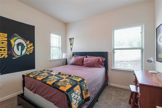 1317 Gaviota Ln, Leander, TX 78641 - bedroom featuring dark carpet and baseboards