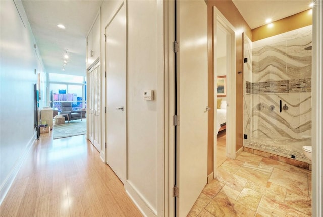 555 E 5th St Unit 809, Austin, TX 78701 - hall featuring baseboards