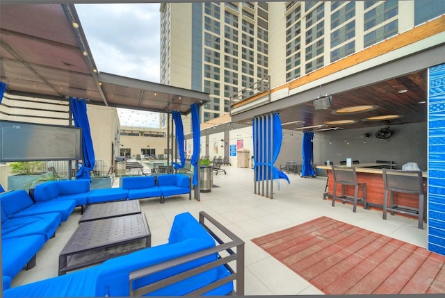 555 E 5th St Unit 809, Austin, TX 78701 - view of patio with an outdoor hangout area and exterior bar
