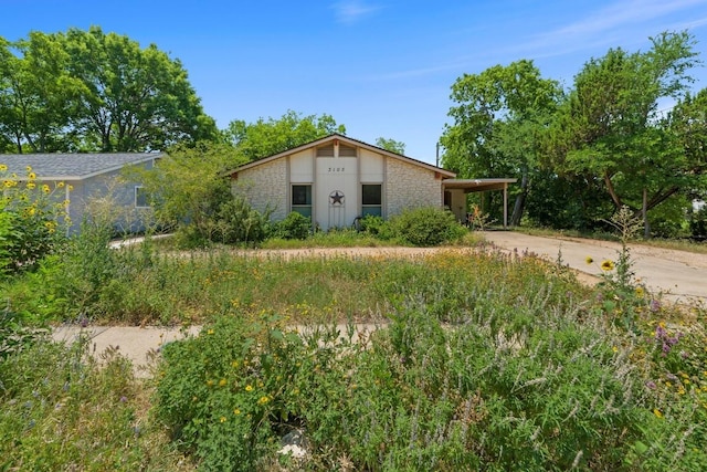 3105 Steck Ave, Austin, TX 78757 - mid-century modern home featuring driveway