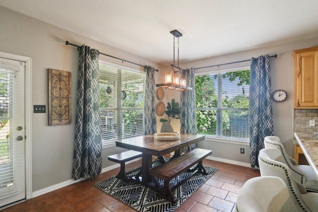 20737 Kearney Hill Rd, Pflugerville, TX 78660 - dining space with tile patterned floors and baseboards