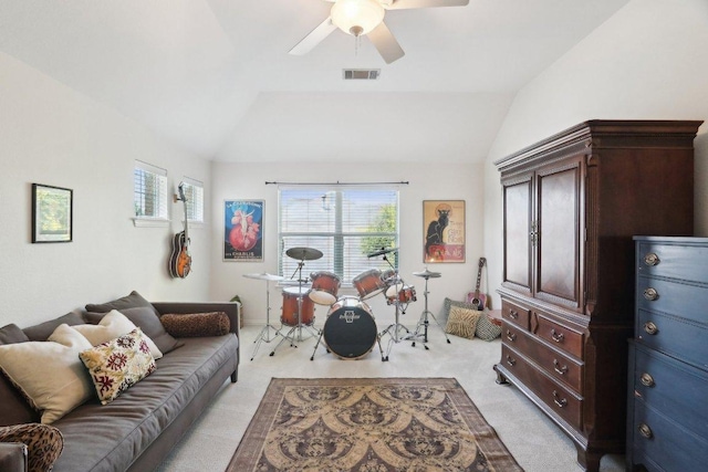 20737 Kearney Hill Rd, Pflugerville, TX 78660 - living room featuring vaulted ceiling, light carpet, a ceiling fan, and plenty of natural light